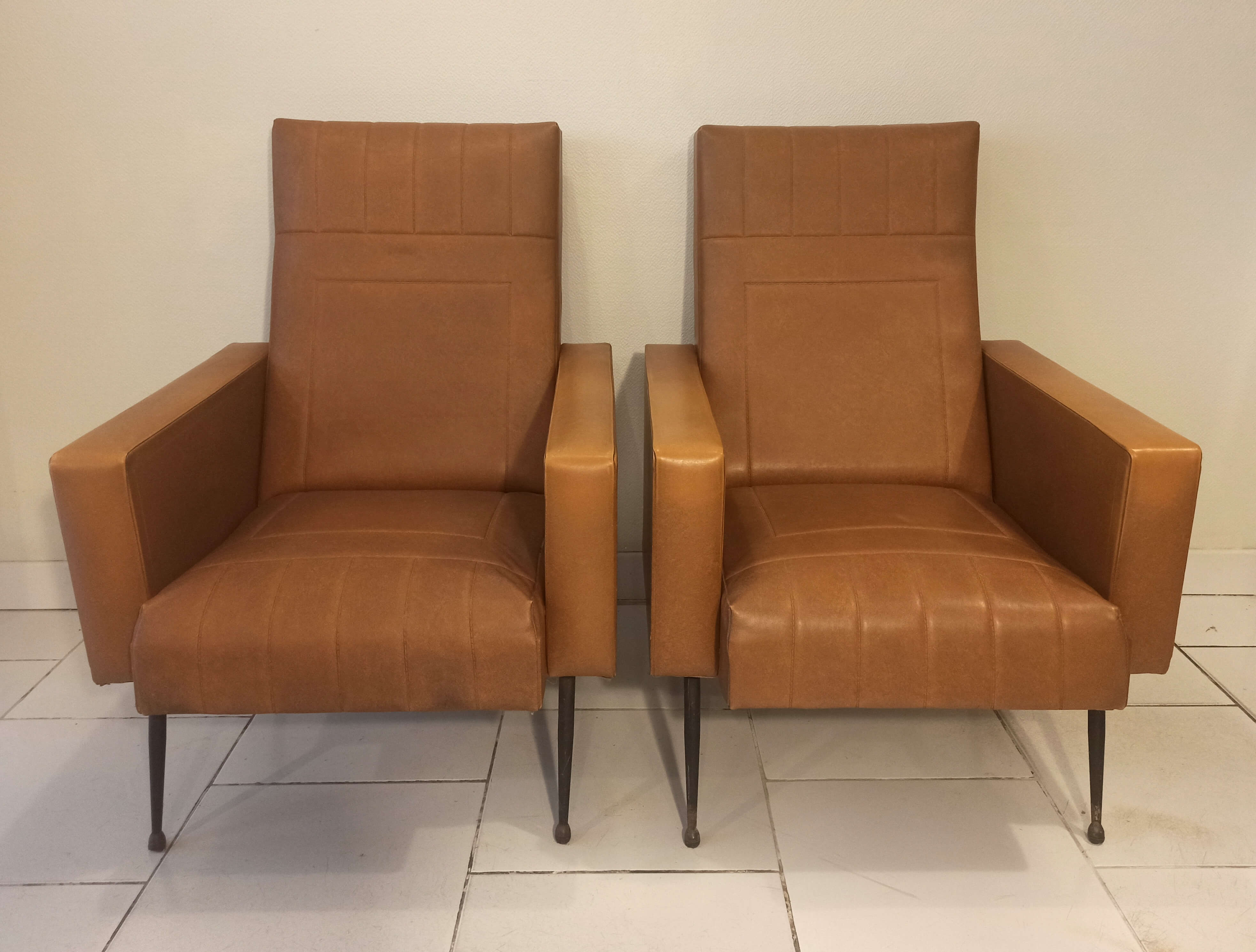 Pair of vintage leatherette armchairs from the 1960s