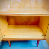Double display case mounted at an angle with doors from the Capelle 60' house in Montauban