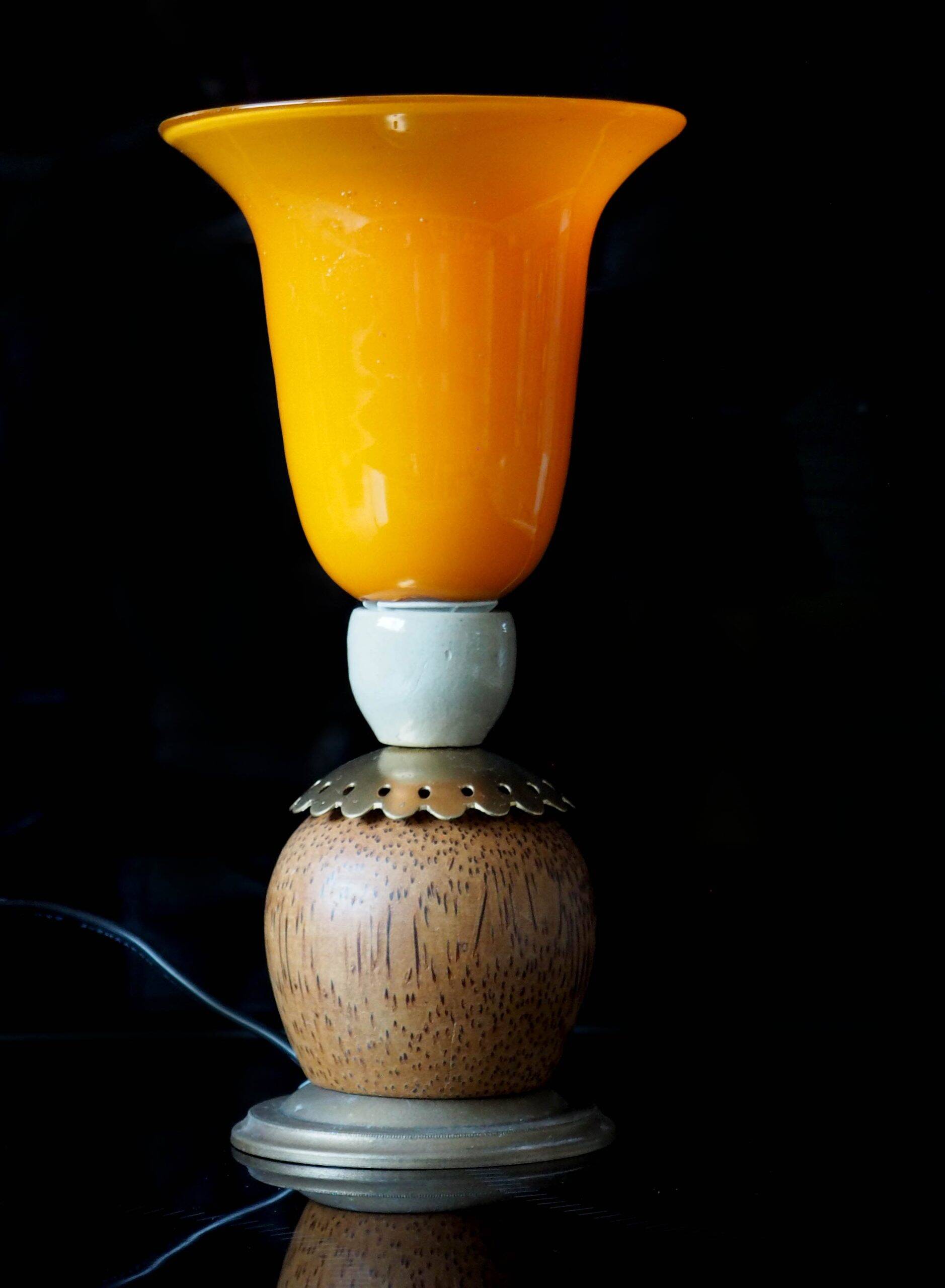 Orange glass ball lamp with wood