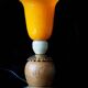 Orange glass ball lamp with wood