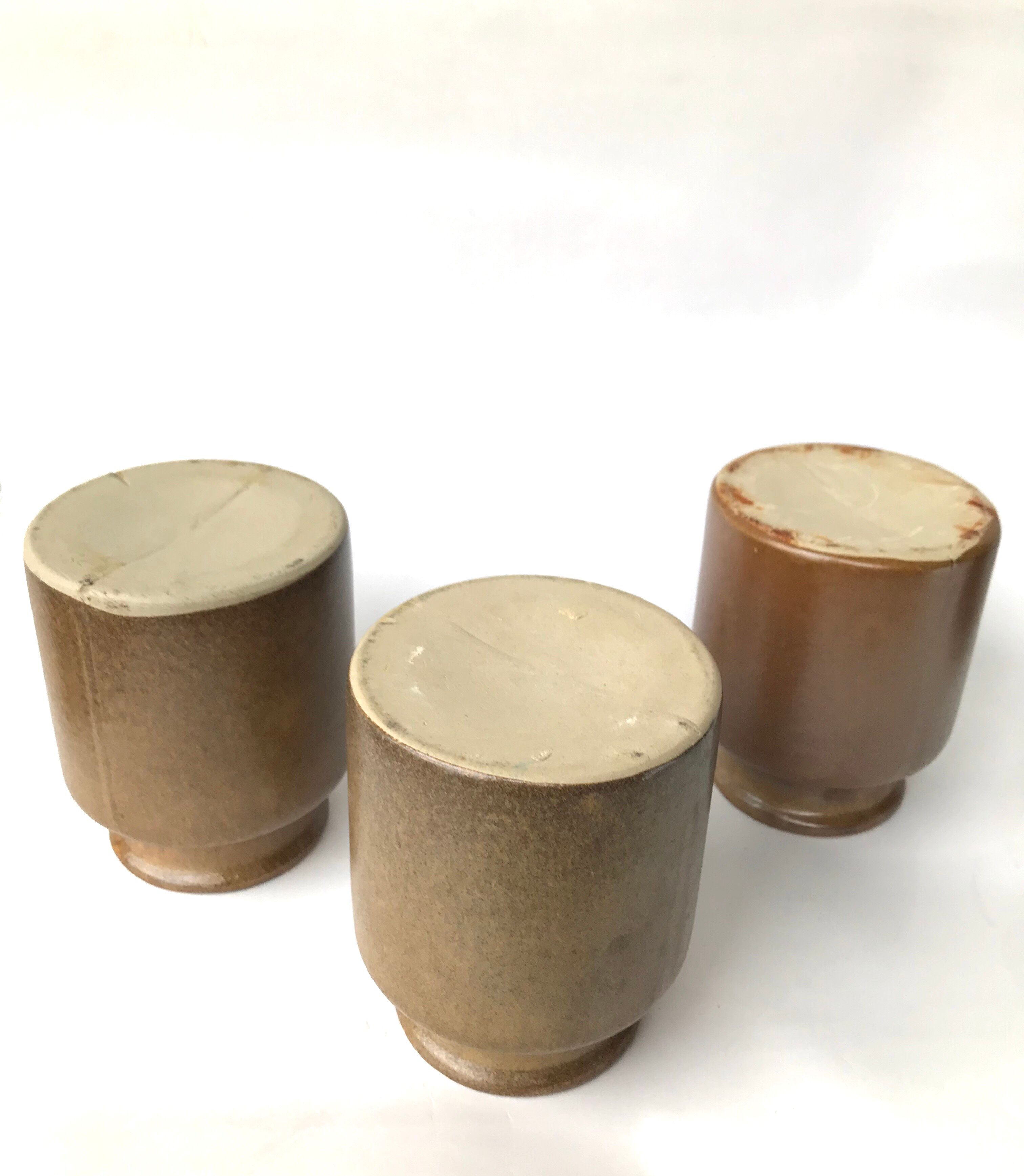 Set of 3 varnished sandstone pots