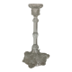 Thick moulded glass candlestick with fish and flowers.