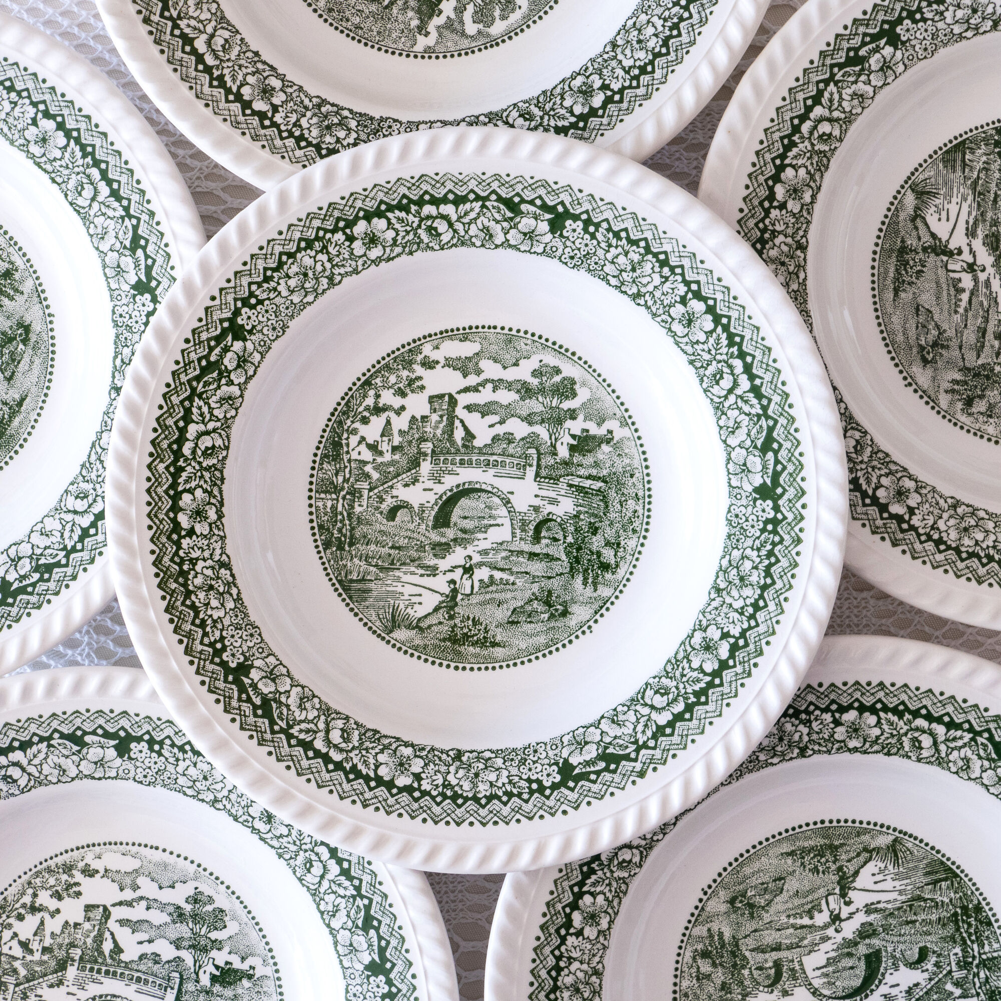 Service of vintage green plates in country English earthenware