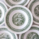Service of vintage green plates in country English earthenware