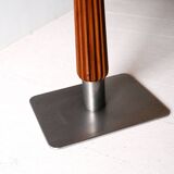 Mahogany bar table with steel base and carved stem