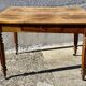 19th-century desk table in light walnut with one drawer.