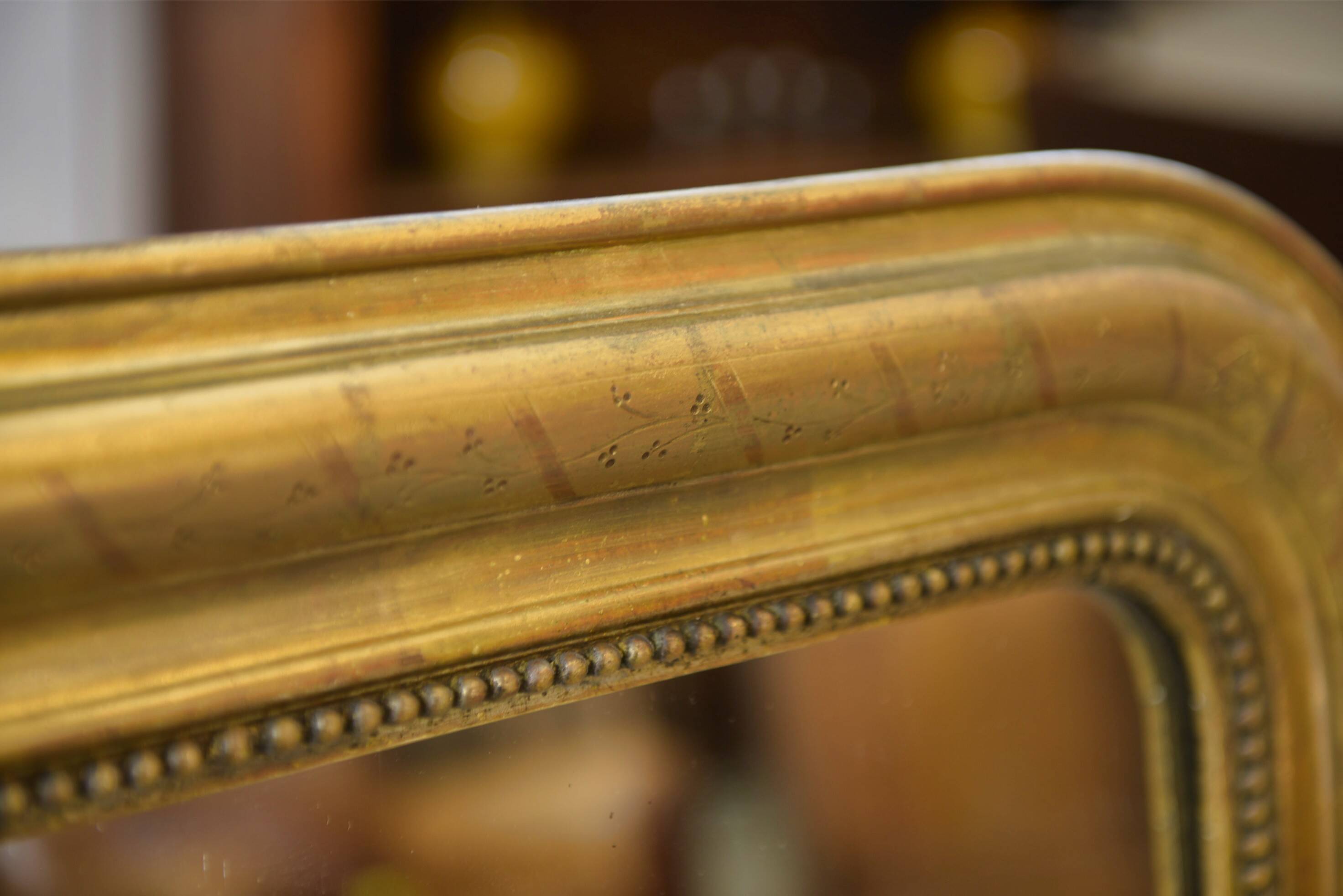 Mercury mirror from the Louis Philippe period, gilded with gold leaf, 19th century.