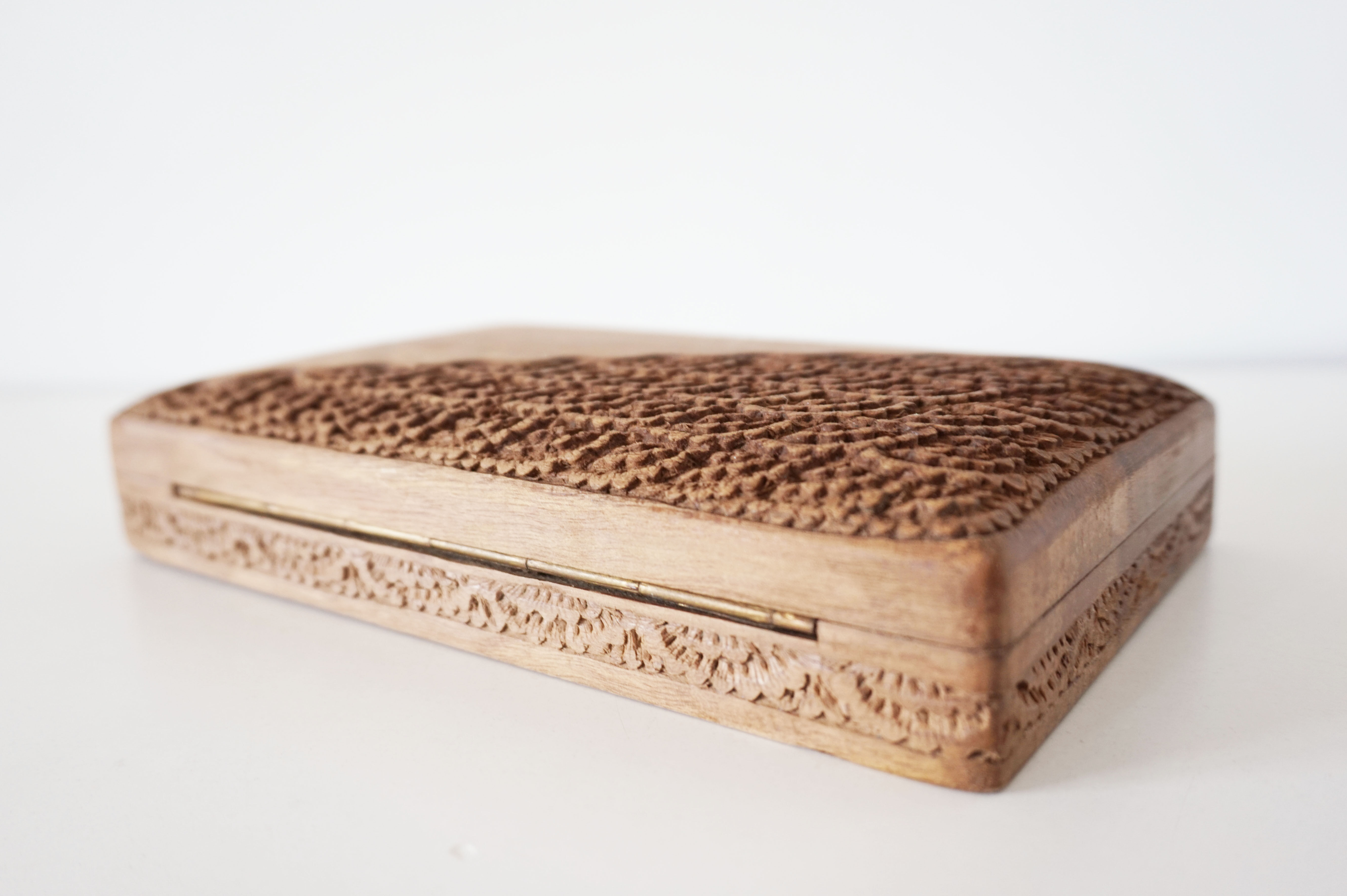 Antique chiseled wooden box