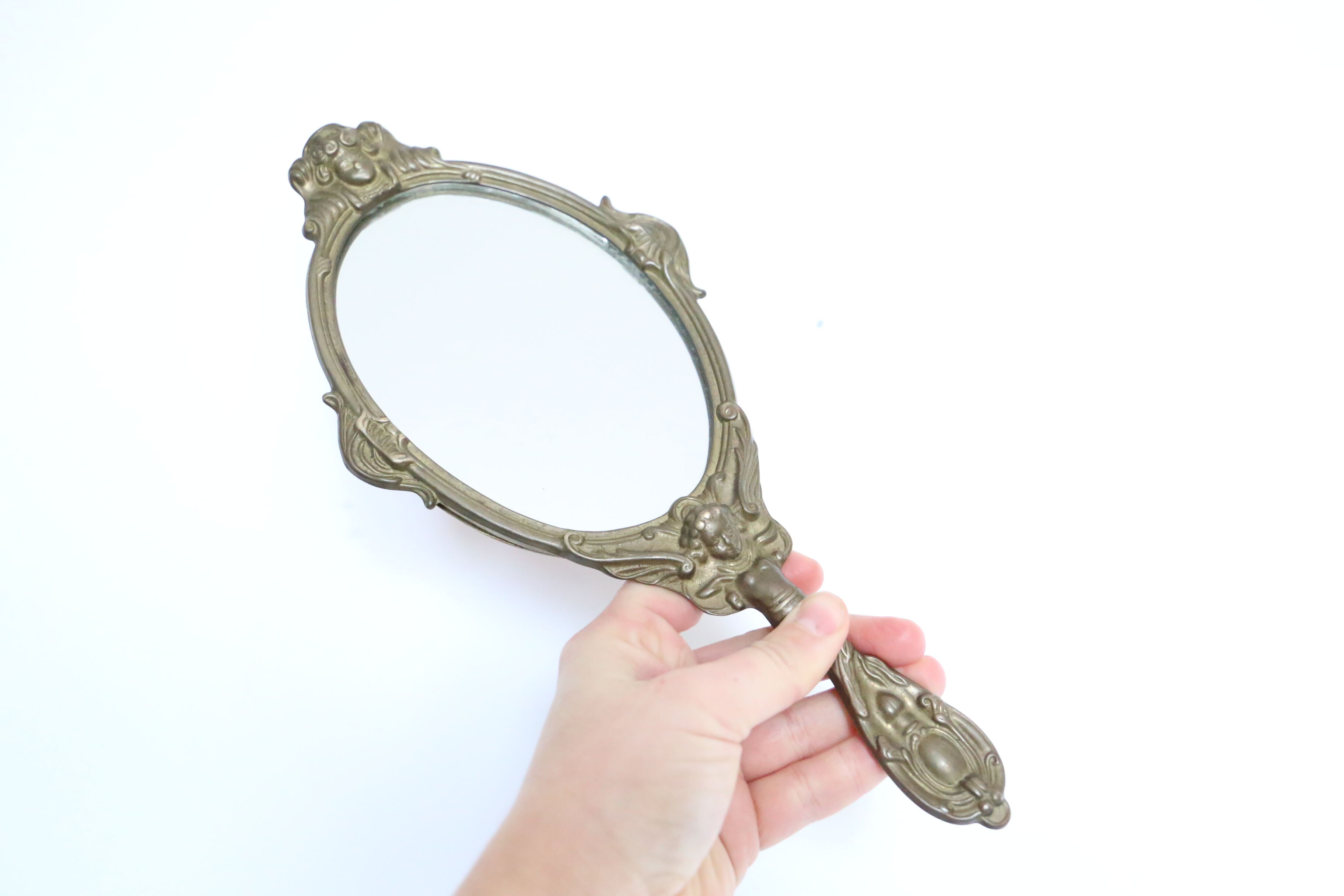 Brass hand mirror