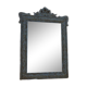 Chic and stylish old mirror with carved wooden frame in limed white and gold