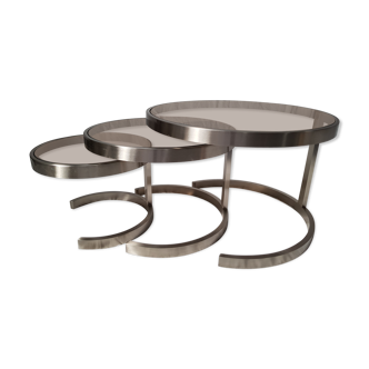 Stainless steel tables and smoked glasses 1970