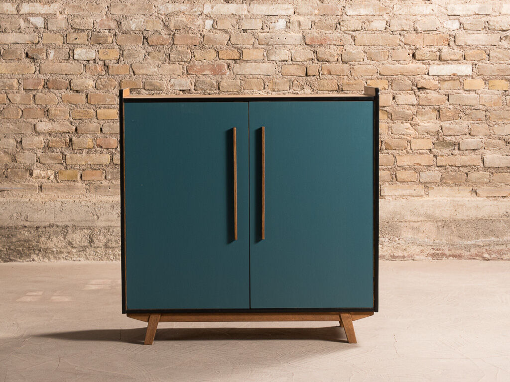 Vintage low sideboard restyled in blue with 2 swing doors and wooden base