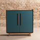 Vintage low sideboard restyled in blue with 2 swing doors and wooden base