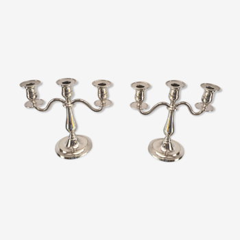 Pair of candlesticks with three silver metal lights