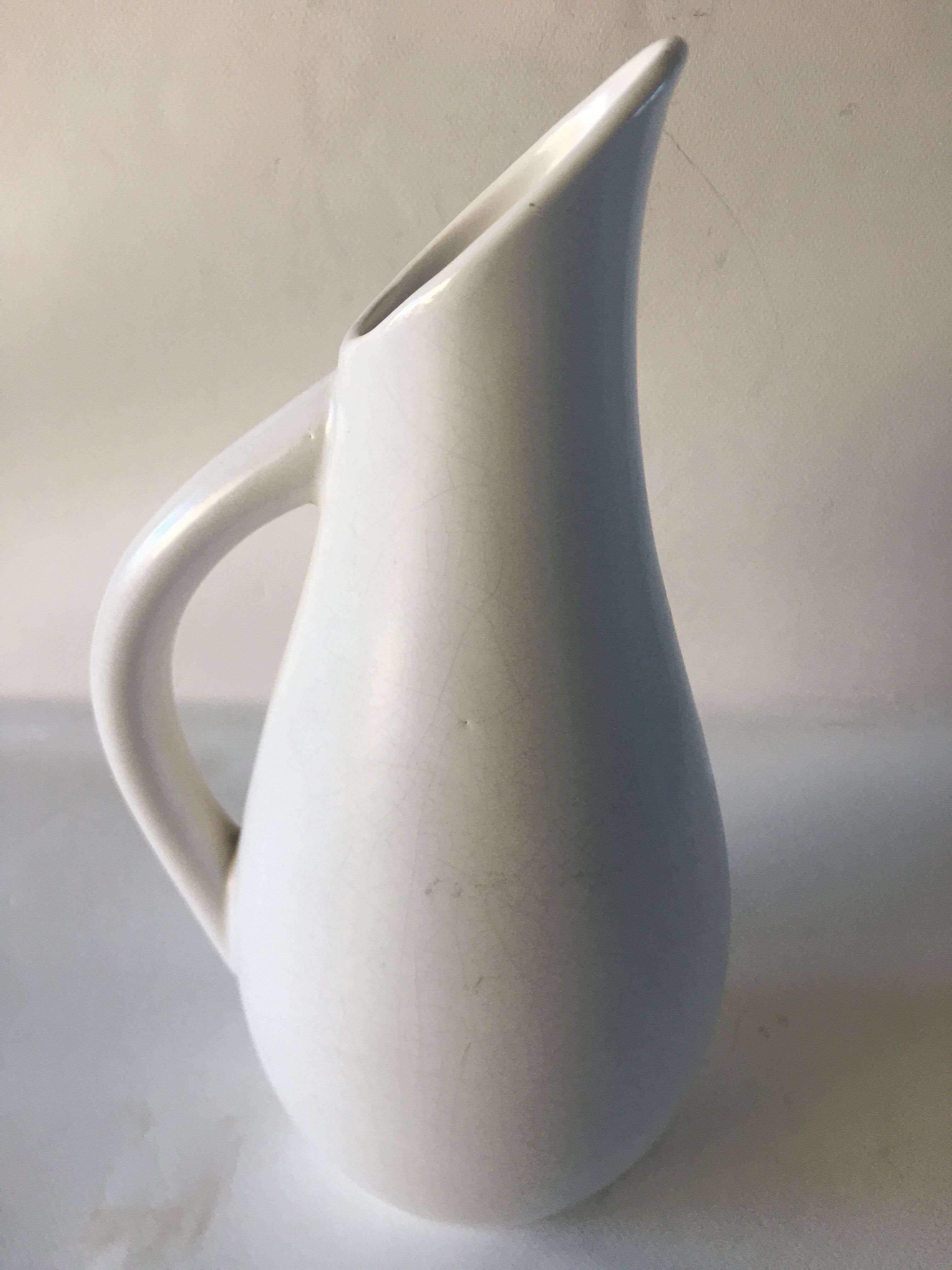 Cracked ceramic pitcher