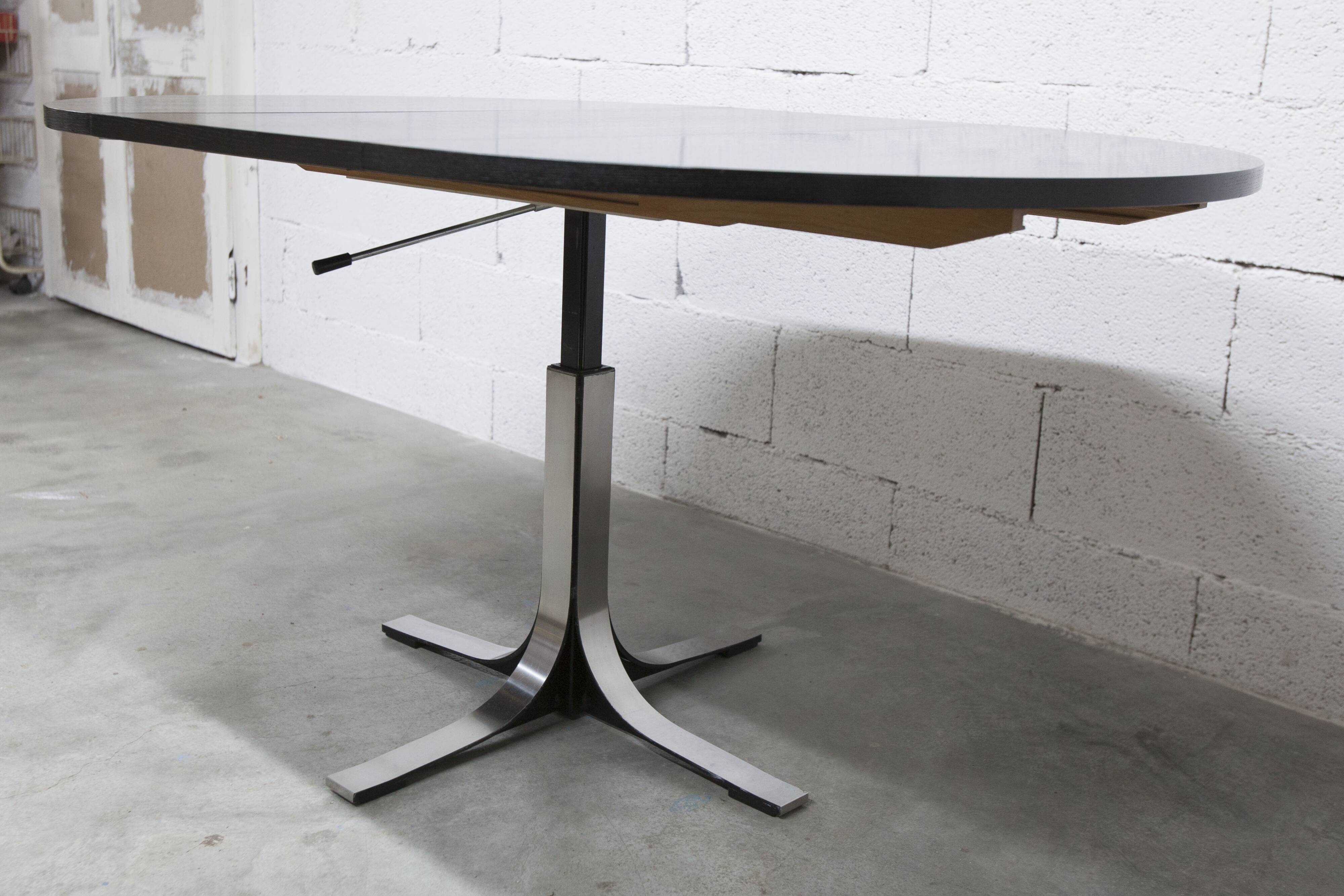 Round table rises and lowers Osvaldo Borsani black and chrome with extension