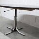 Round table rises and lowers Osvaldo Borsani black and chrome with extension