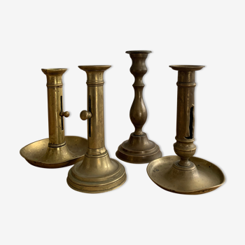 Set 4 vintage brass candlesticks patinated
