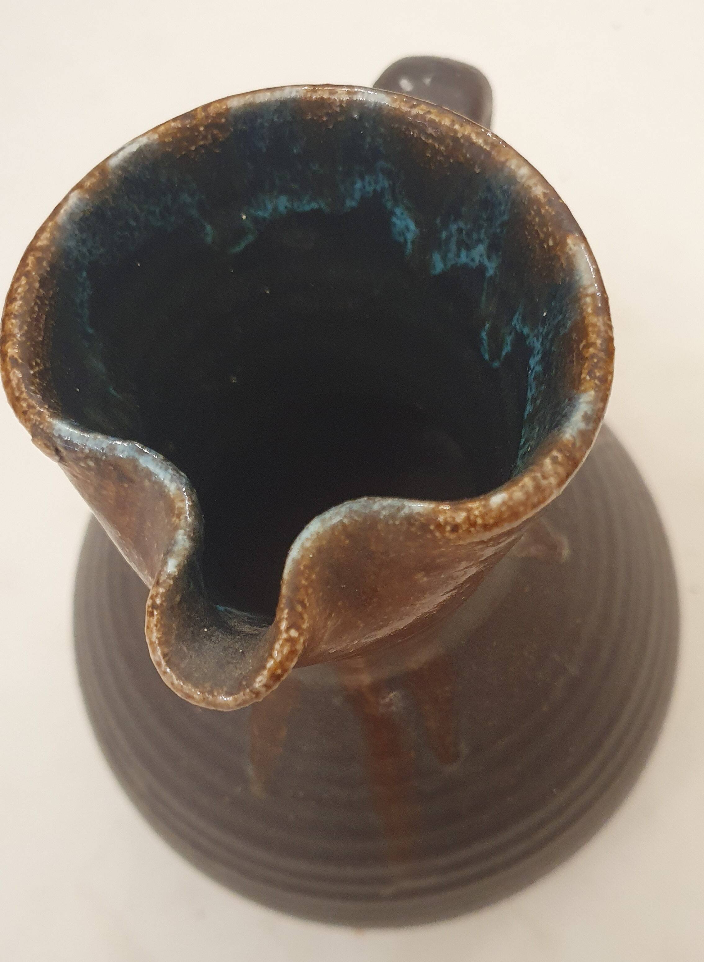 Artisanal jug with flamed interior