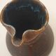 Artisanal jug with flamed interior