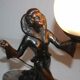 Art deco lamp in regul and marble "woman holding a globe"