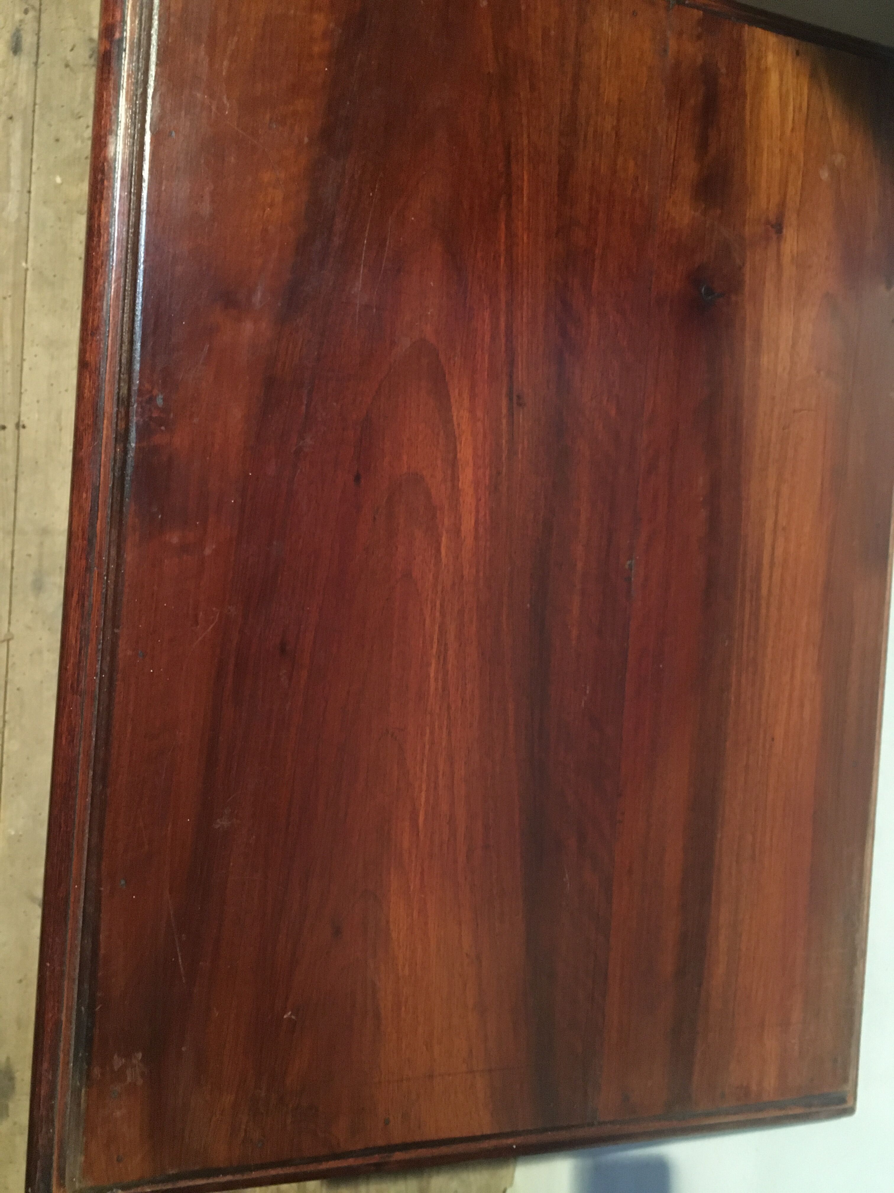 Carved wooden sofa end, mahogany