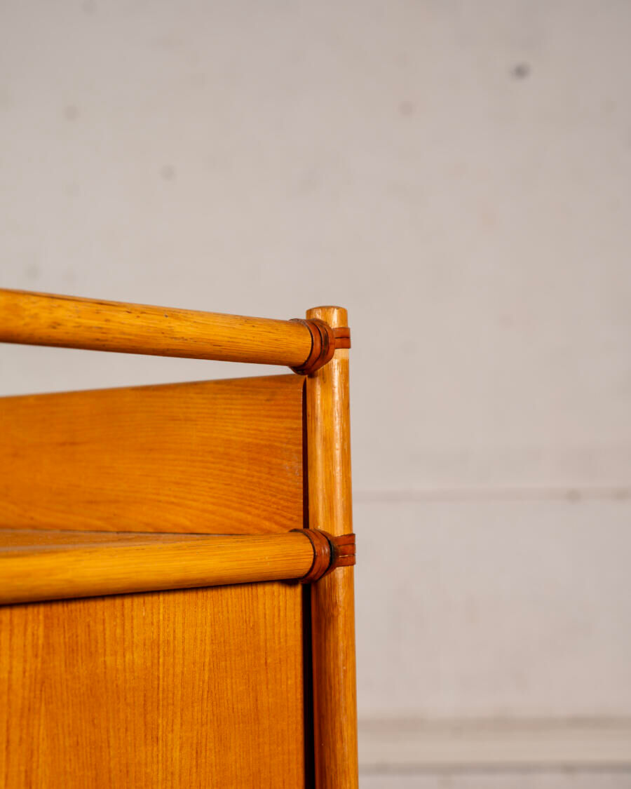 Small storage unit in cane and wood.