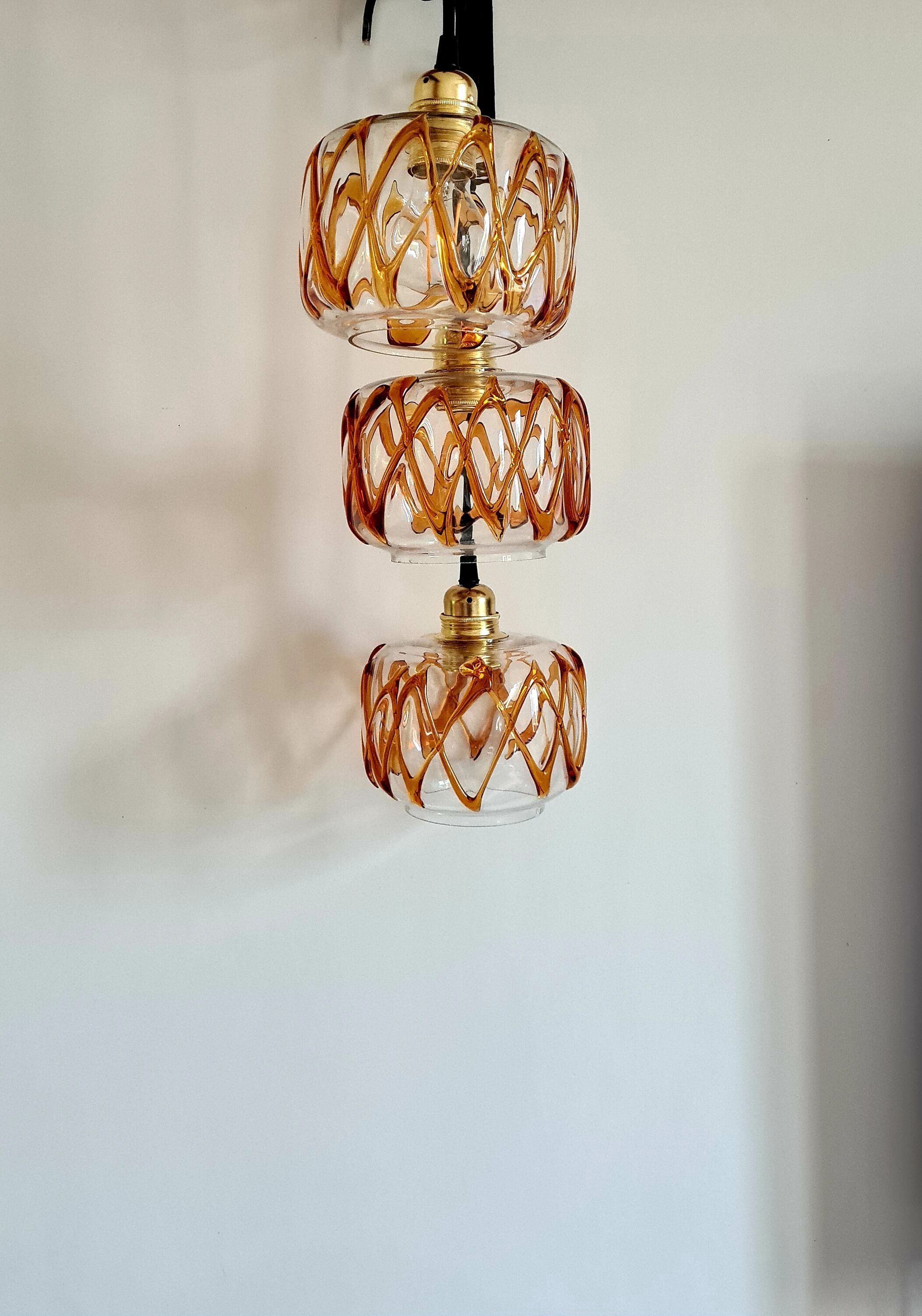 Amber blown glass suspension