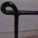 Black metal and rattan bed frame