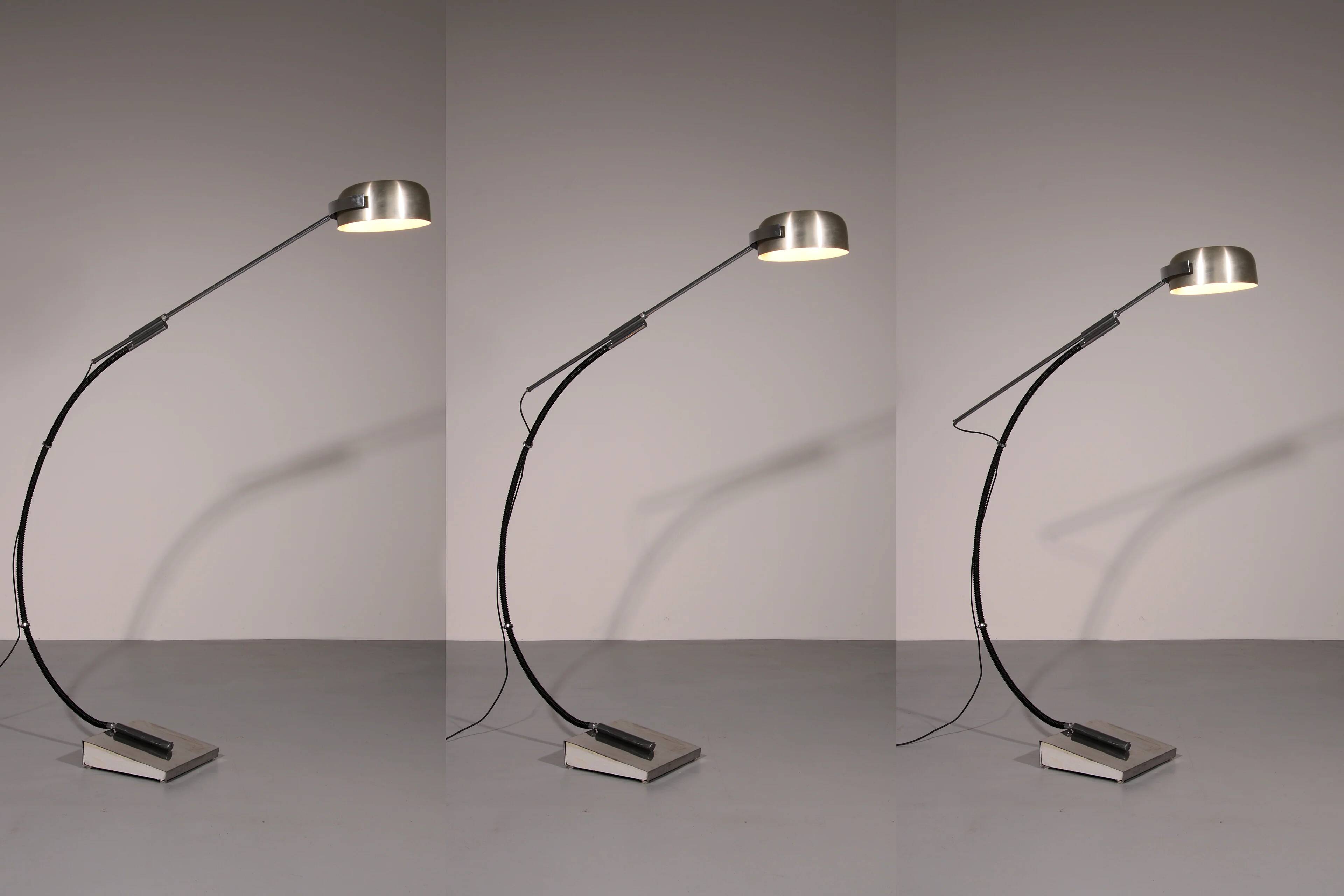 Iconic 1970s chrome arc floor lamp with adjustable swing arm, 1970 Italy