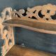 Antique shelf with openwork wooden pediment, early 20th century