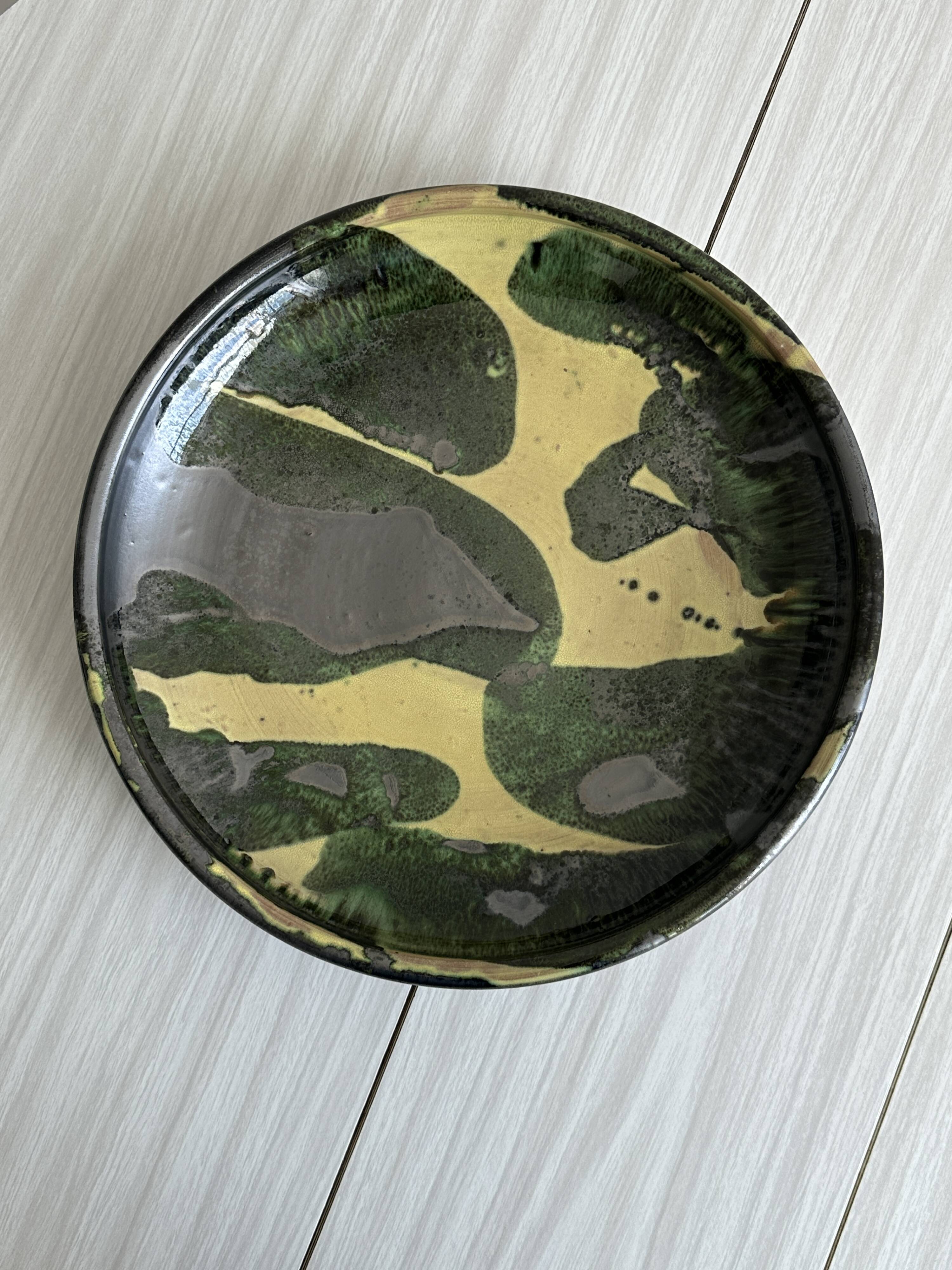 large colored terracotta ceramic dish