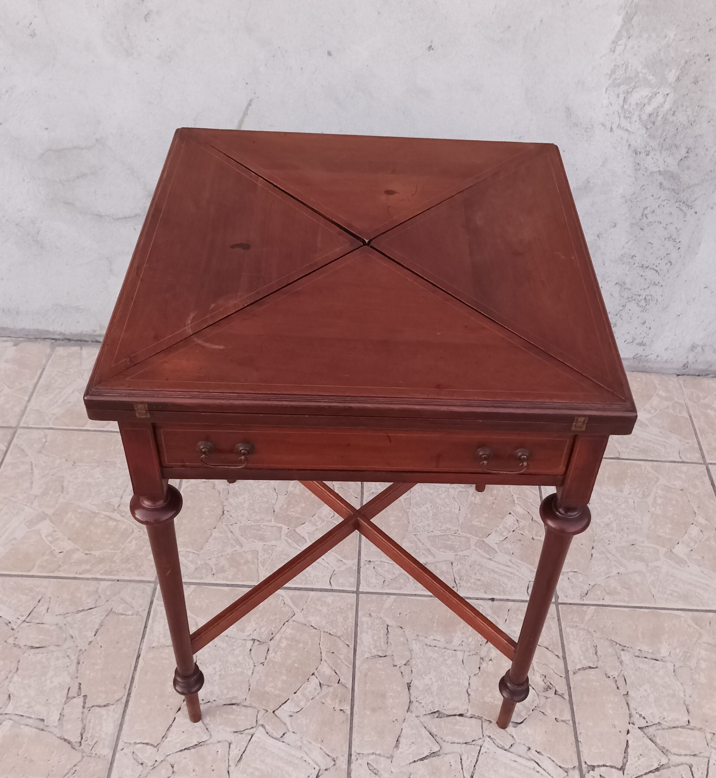 Game table in mahogany late 19th