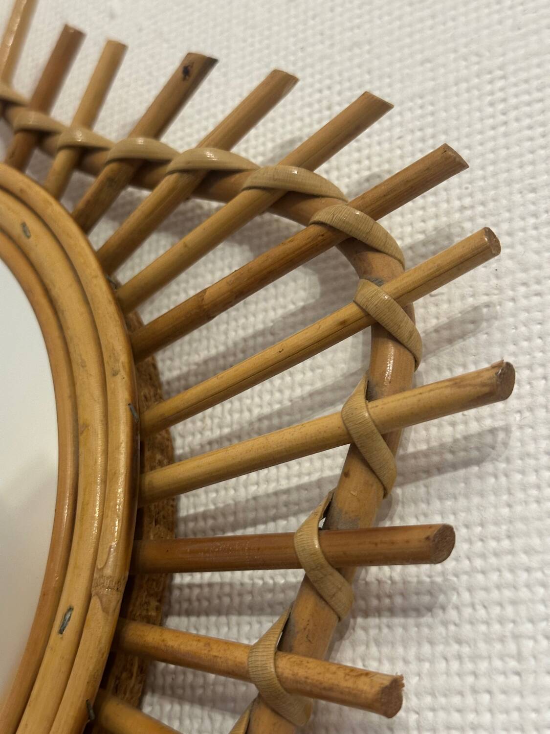 The vintage guitar rattan mirror.