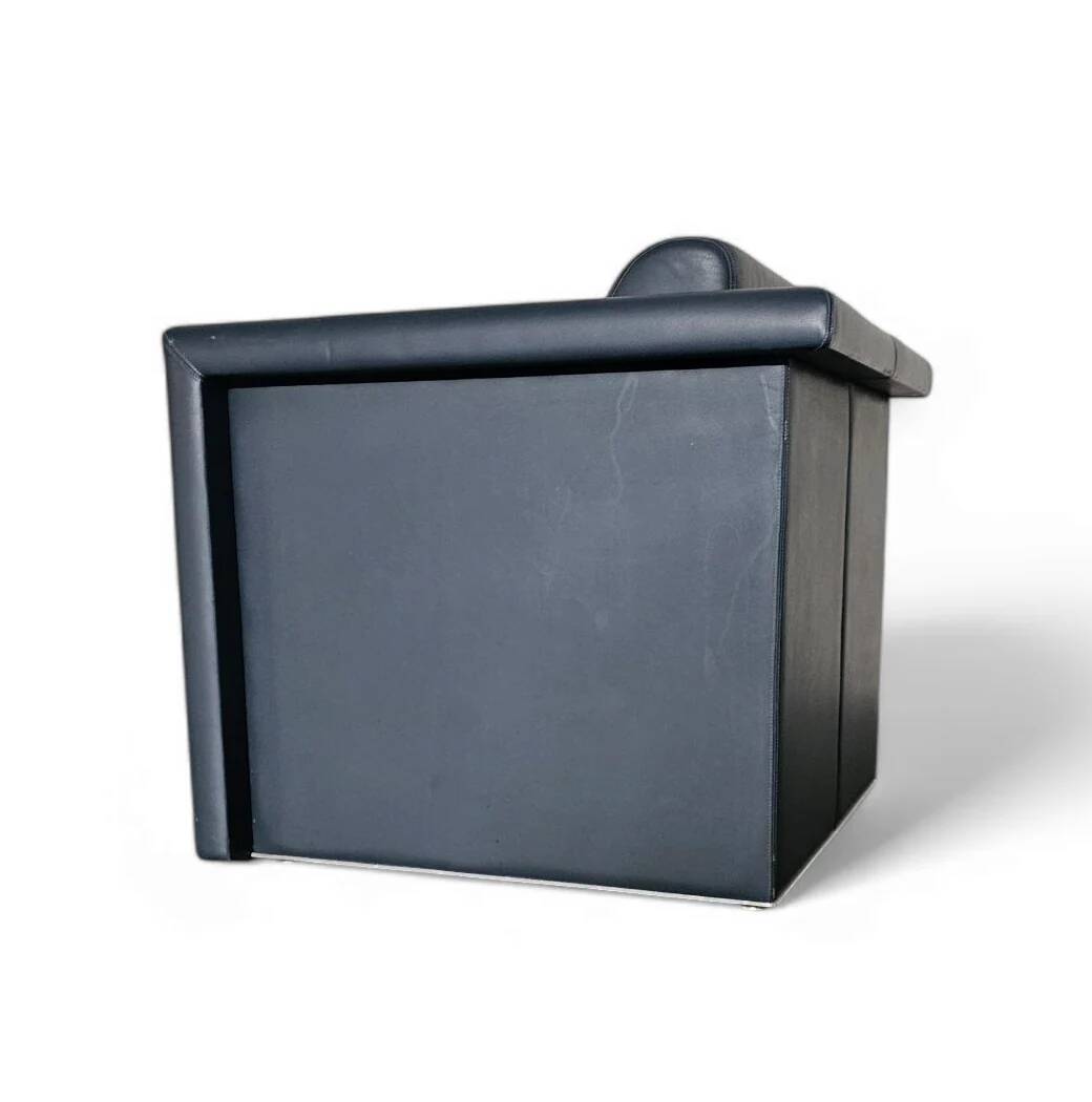 Pair / Trix and Robert Haussmann / Dark grey leather chairs by Knoll