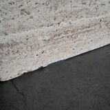 Round coffee table in travertine