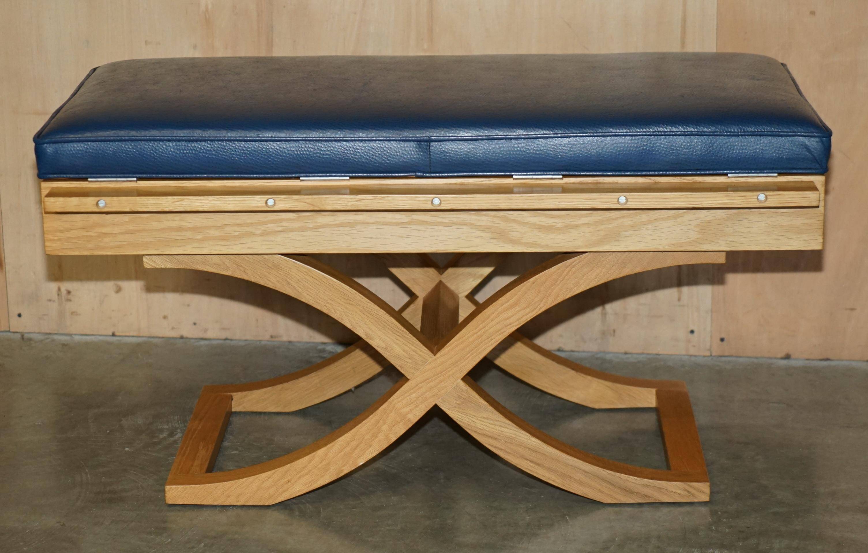 David Linley Hall bench in ostrich leather and satinwood with storage.