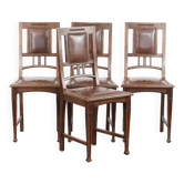 Ensemble de quatre chaises de salle à manger en chêne antique de style Art Nouveau.