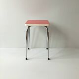 Stool in pinkish red formica