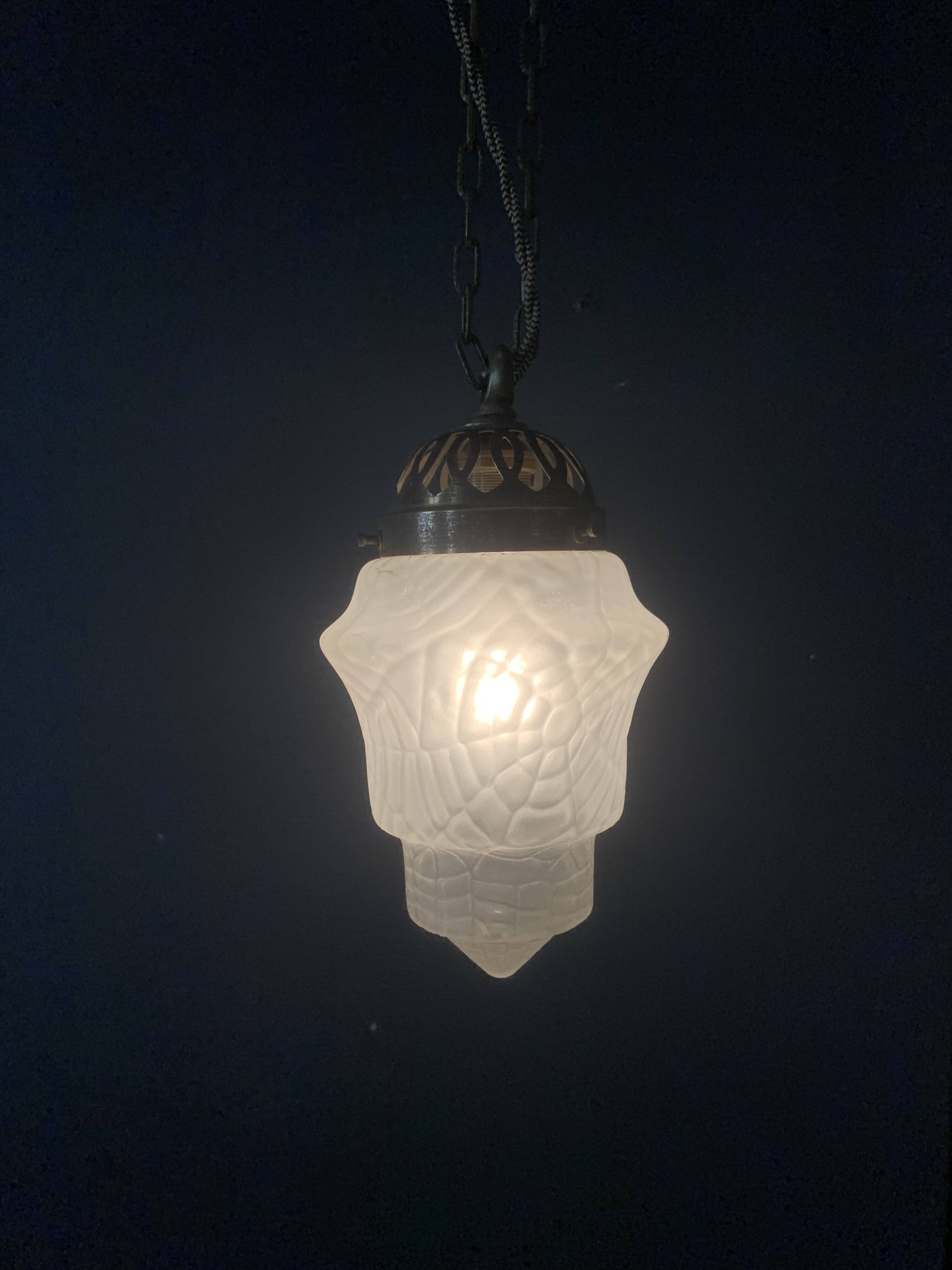 Art Deco pendant light and polished glass spider globe, 1930