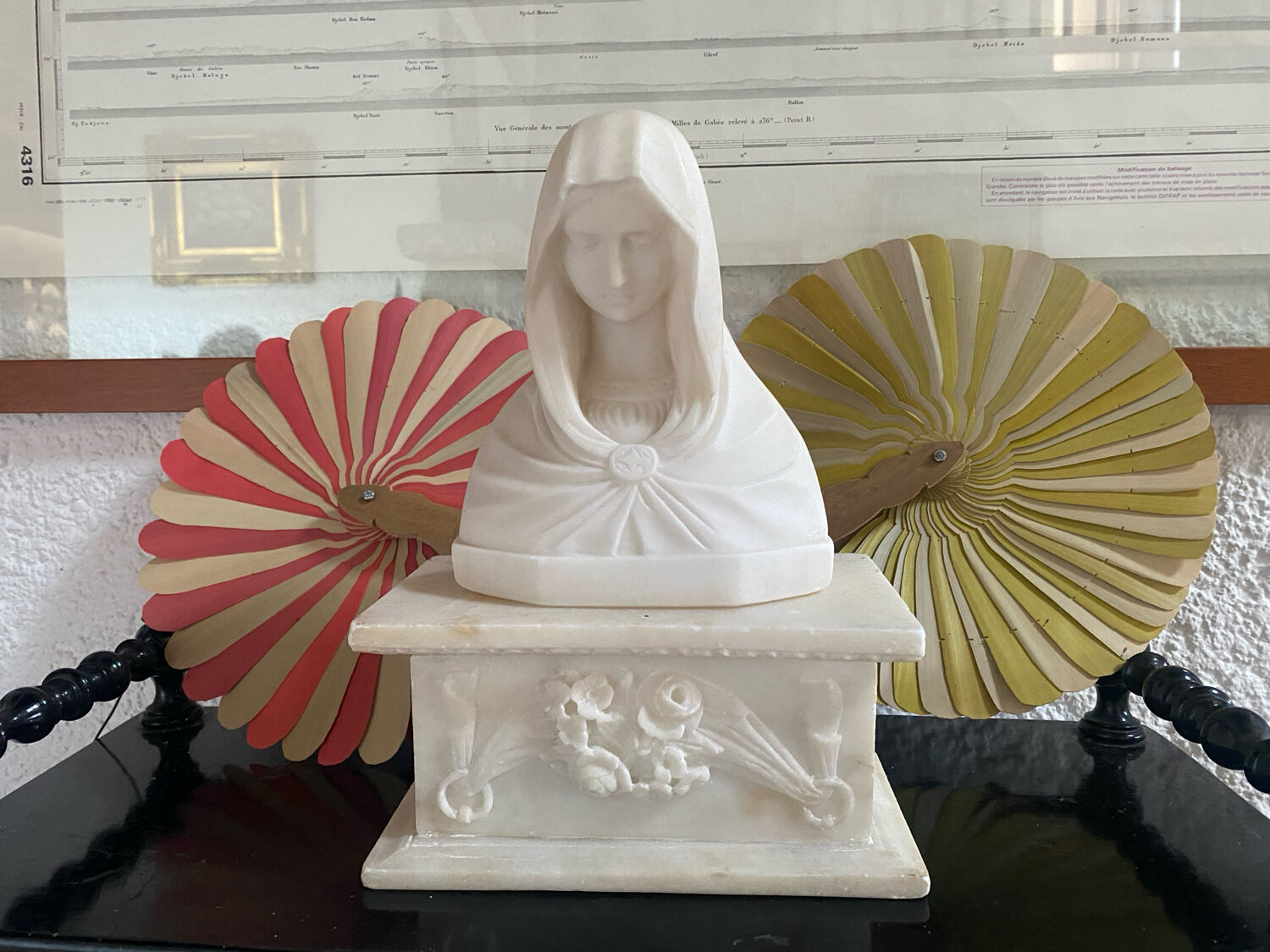 Marble Virgin Mary with her 19th-century base.