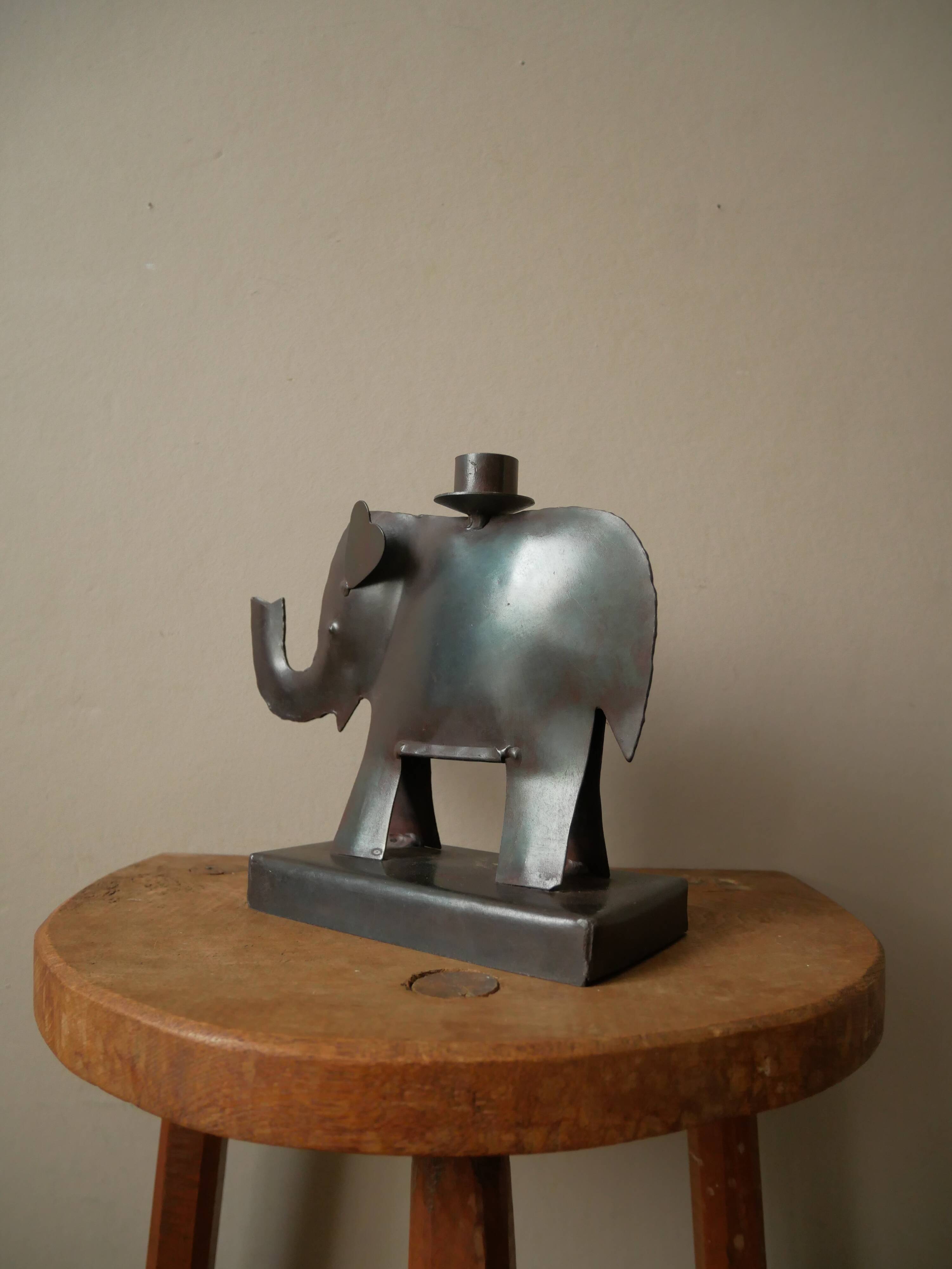 Candle holder in metal