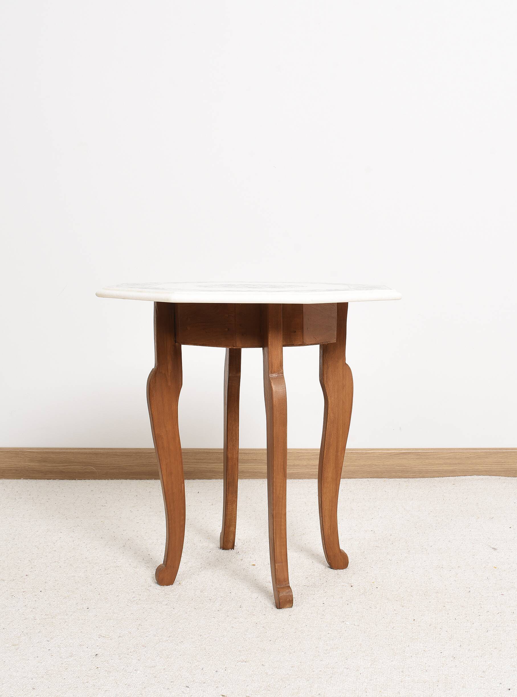 Side table with marble top and inlaid stones