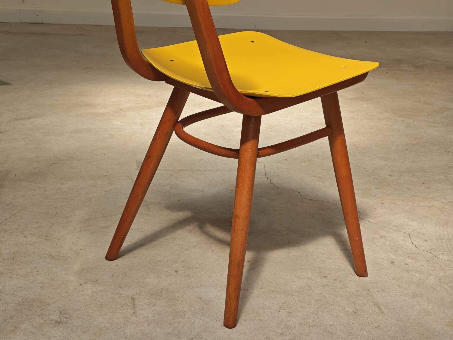 Pair of Ton Bystrice Thonet chairs in wood and yellow molded plastic