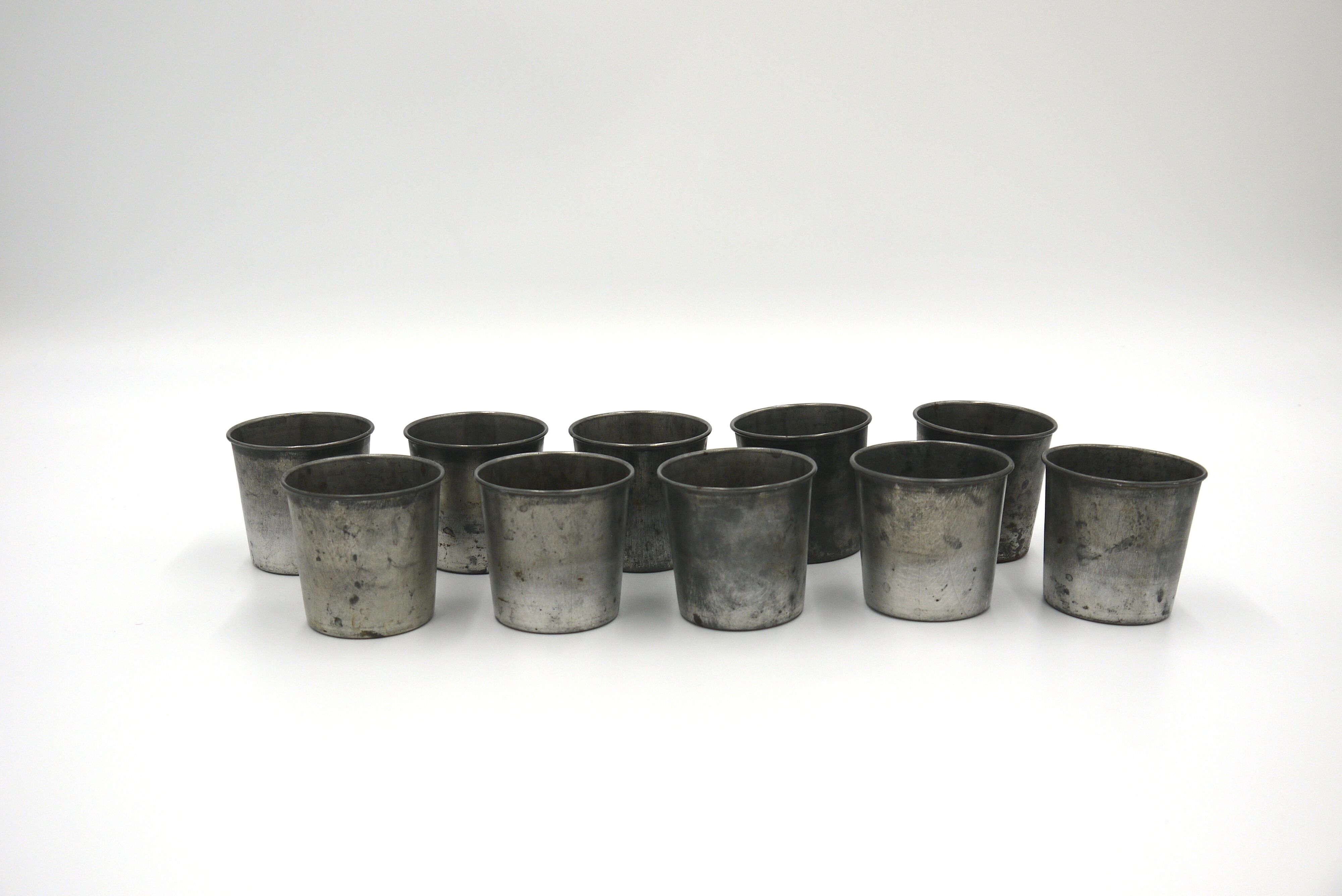Set of 10 tin cups