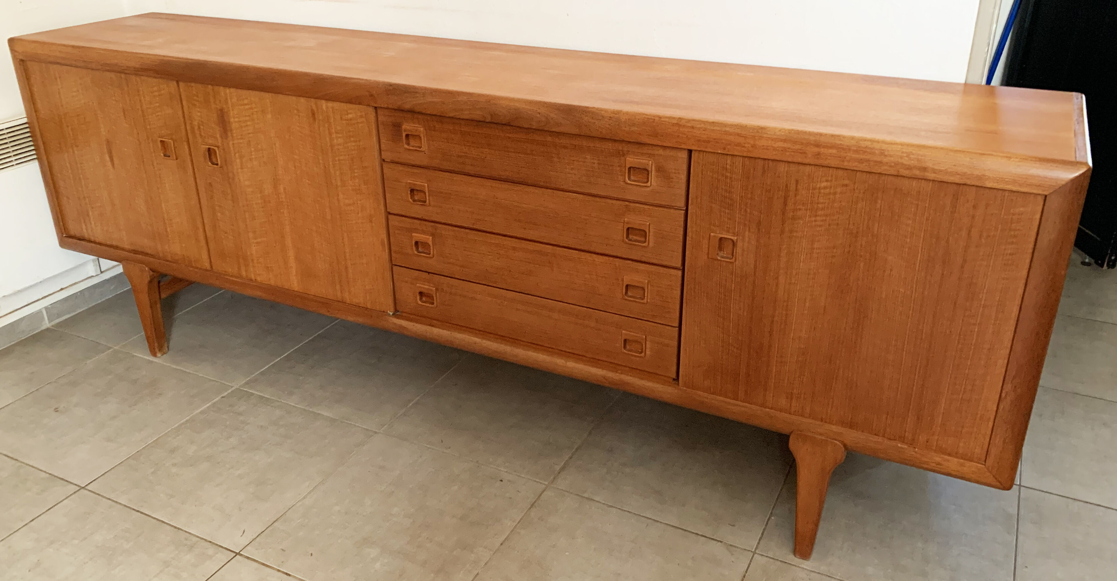 Large Danish vintage row in blond teak from the 60s