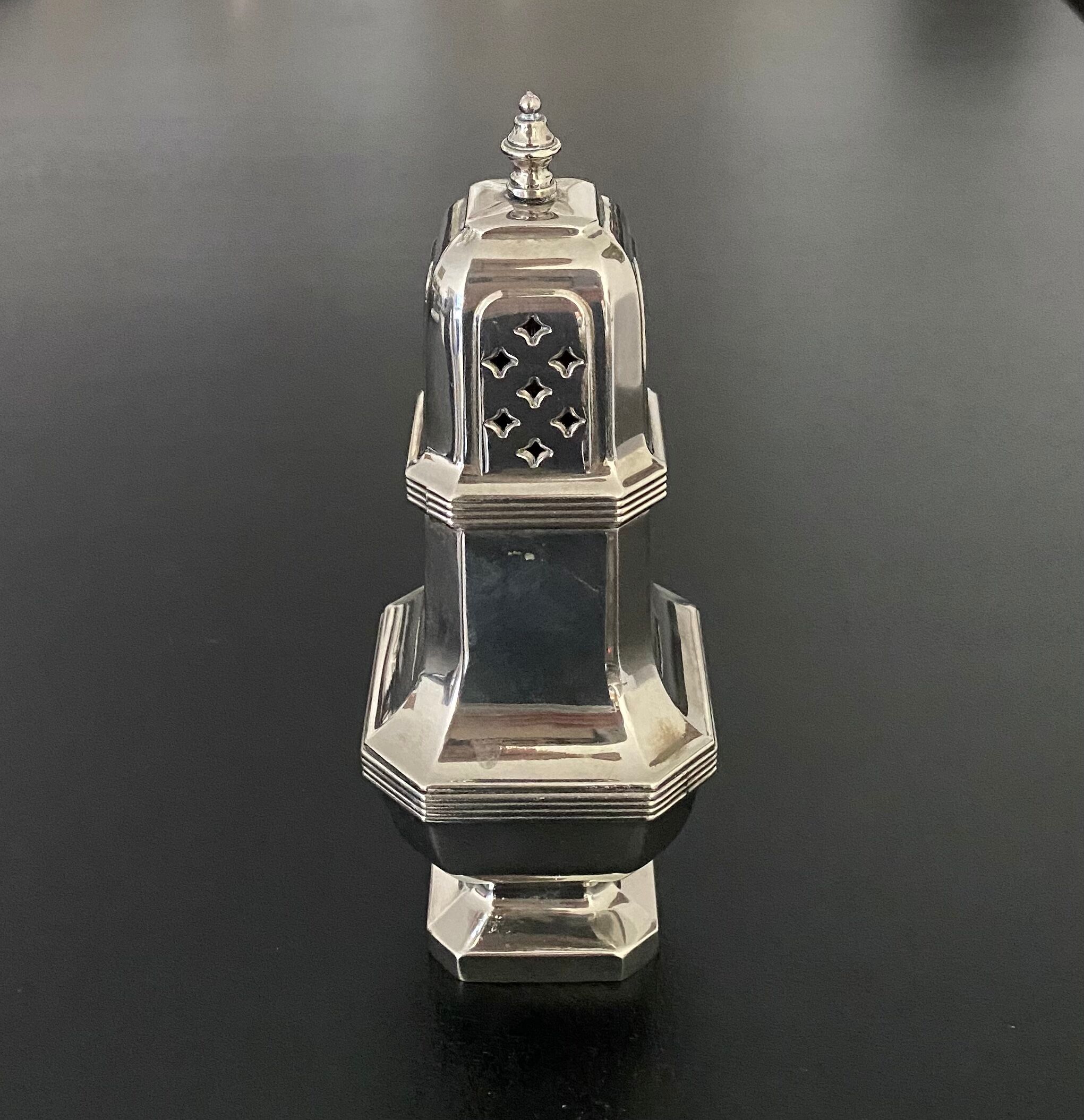 1 silver metal sprinkler