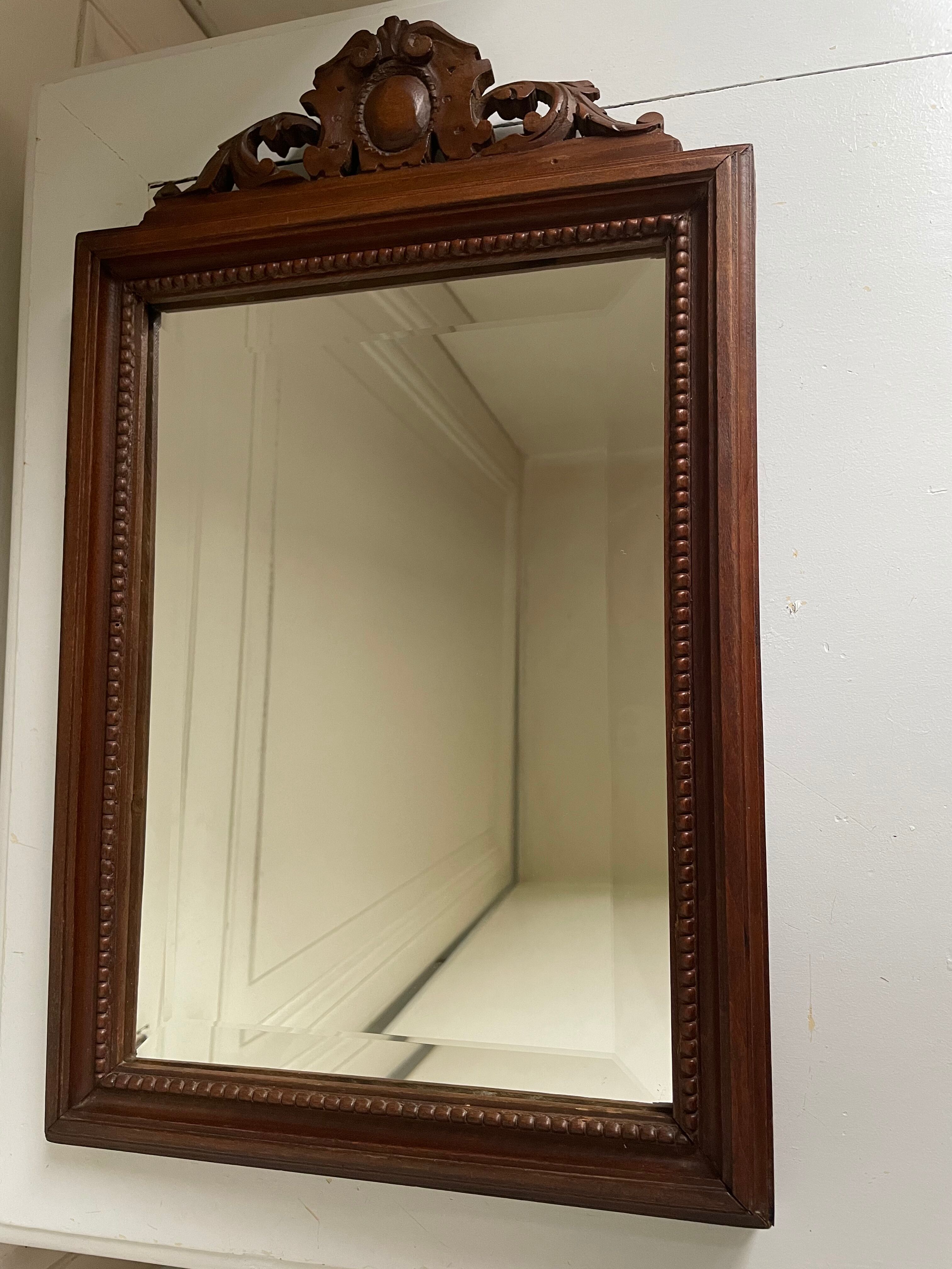 Bevelled mirror frame carved wood