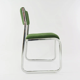 Chrome metal sled chair with green fabric