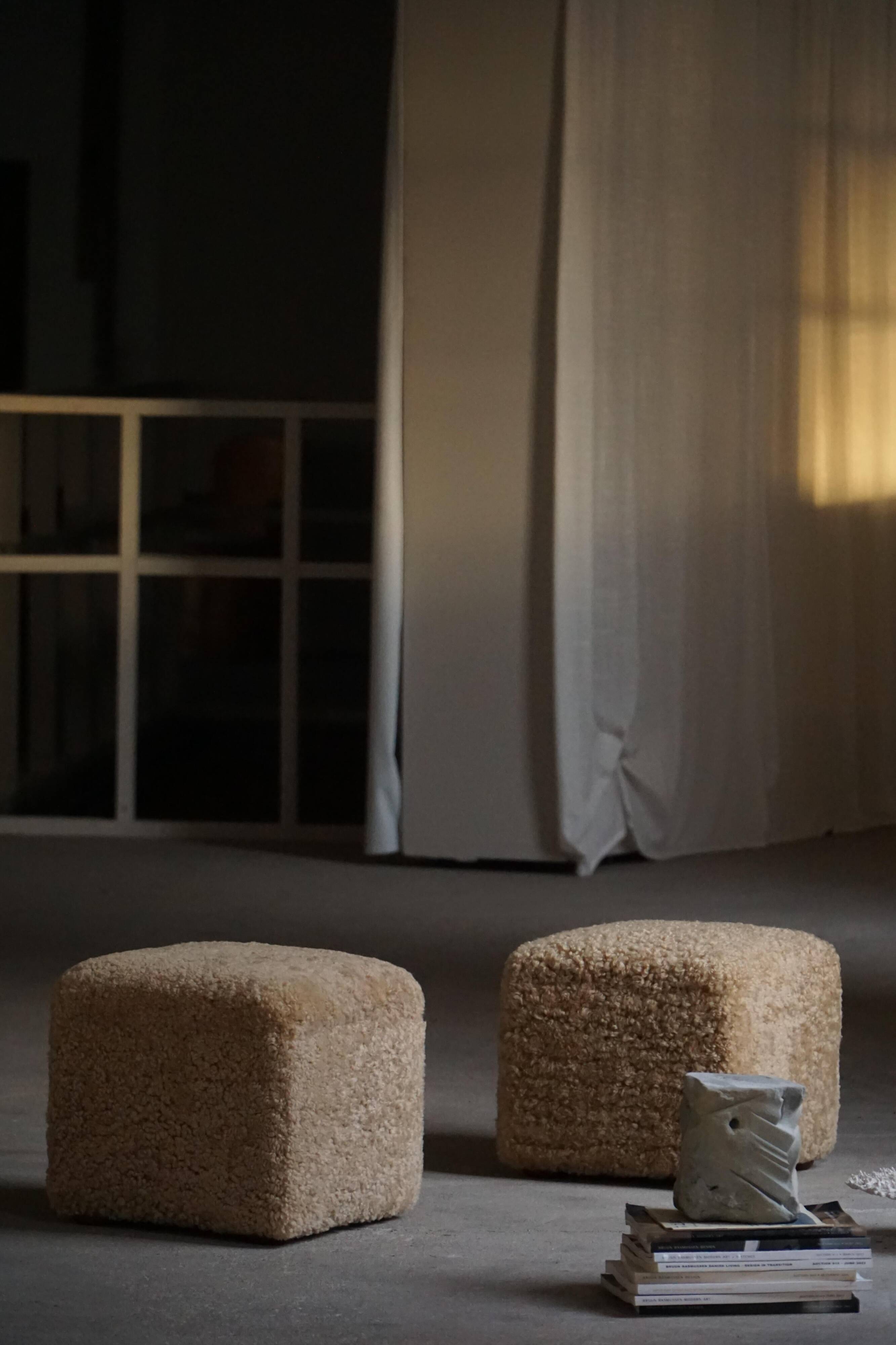 French mid-century cube poufs, a pair of lambswool stools, 1960s.